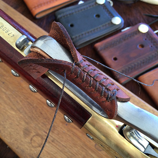 Ricochet Roy's cowboy leather lever wrap installation