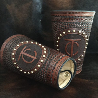 Authentic leather cowboy roping cuffs with custom brand