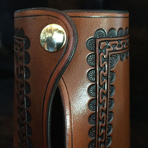 Authentic leather cowboy roping cuffs with braid