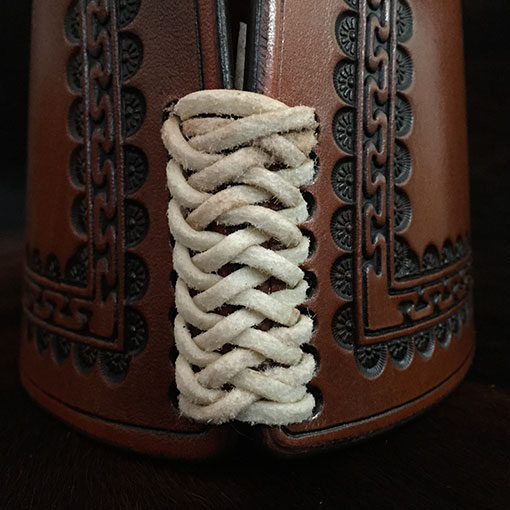 Authentic leather cowboy roping cuffs with braid