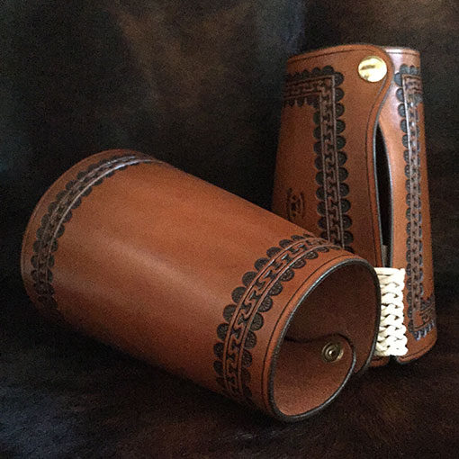 Authentic leather cowboy roping cuffs with braid