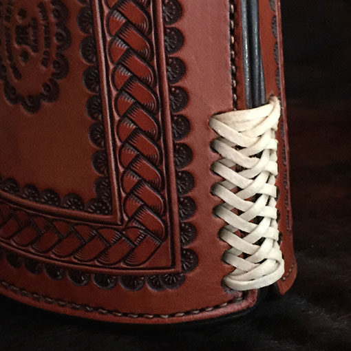Authentic leather cowboy roping cuffs with braid